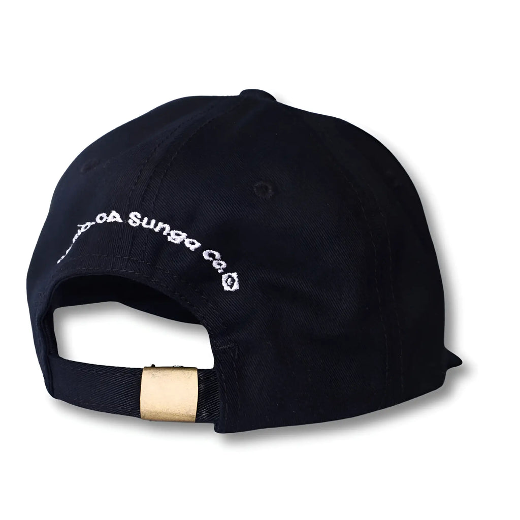Black dad hat made in brasil with white embroidered text and gold-tone metal adjustment strap on the back