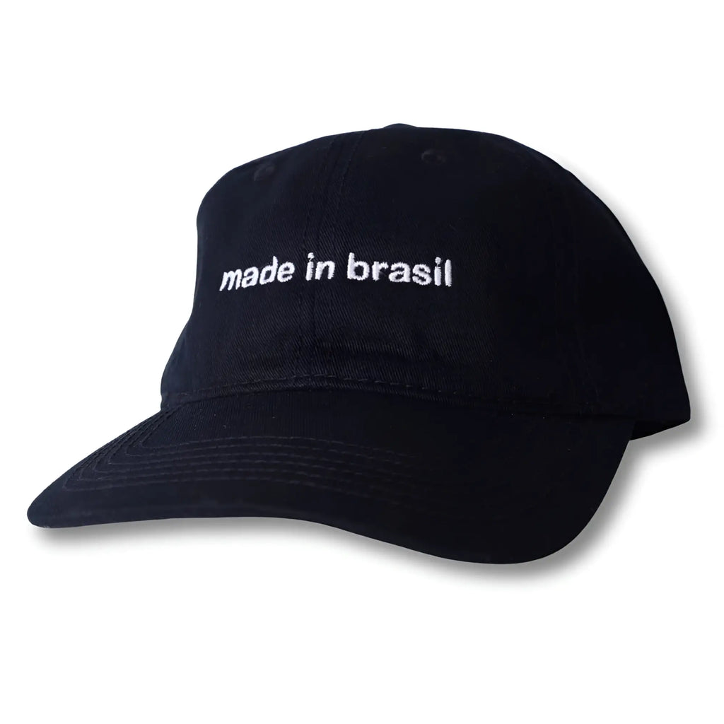 Black cotton dad hat with white embroidered made in brasil text across the front perfect for casual wear