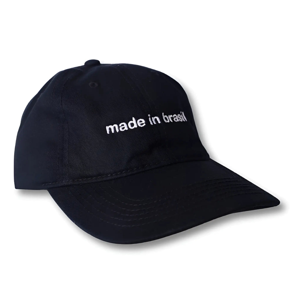 Black cotton dad hat with white embroidered made in brazil text on the front panel