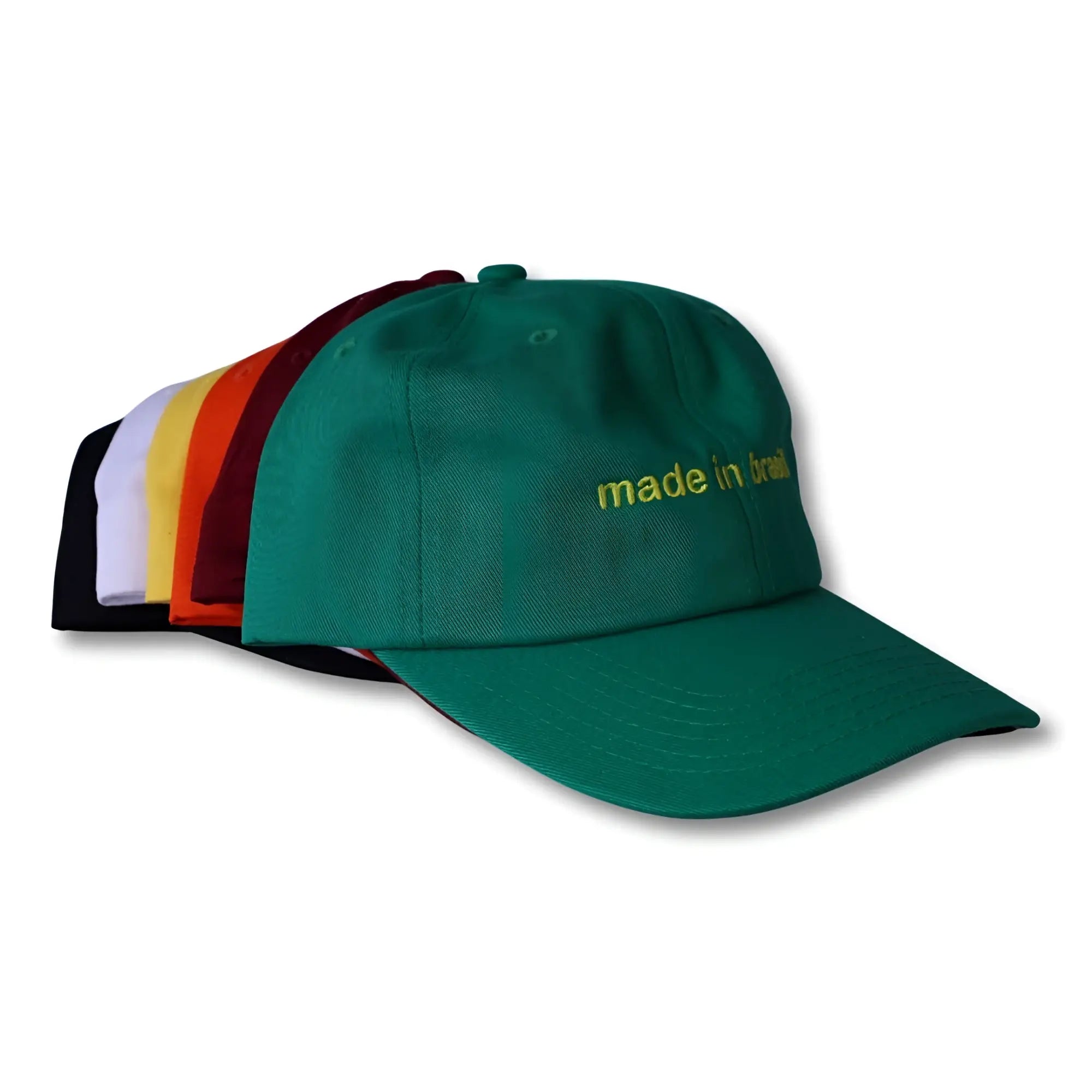 Green dad hat with made in brazil embroidered in gold thread on front for casual wear