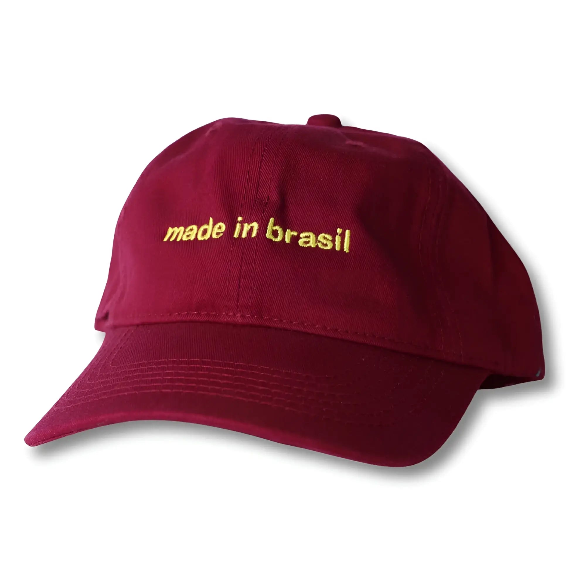 Maroon dad hat baseball cap with gold embroidered made in brasil text on front panel