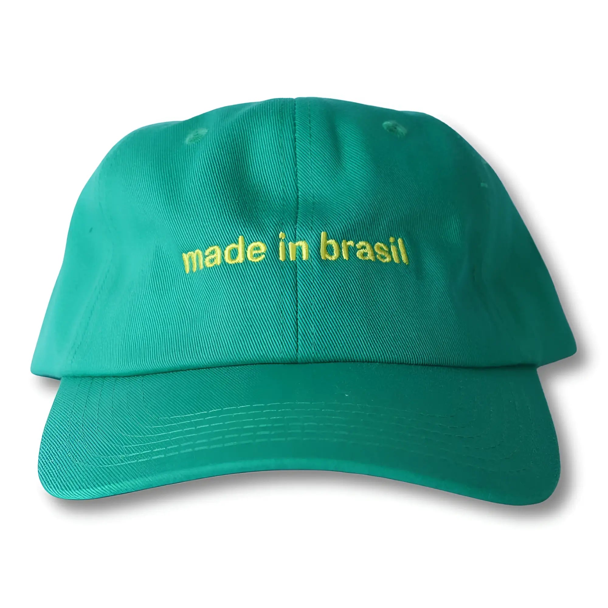 Teal dad hat with yellow embroidered made in Brasil text across the front featuring a casual baseball cap design