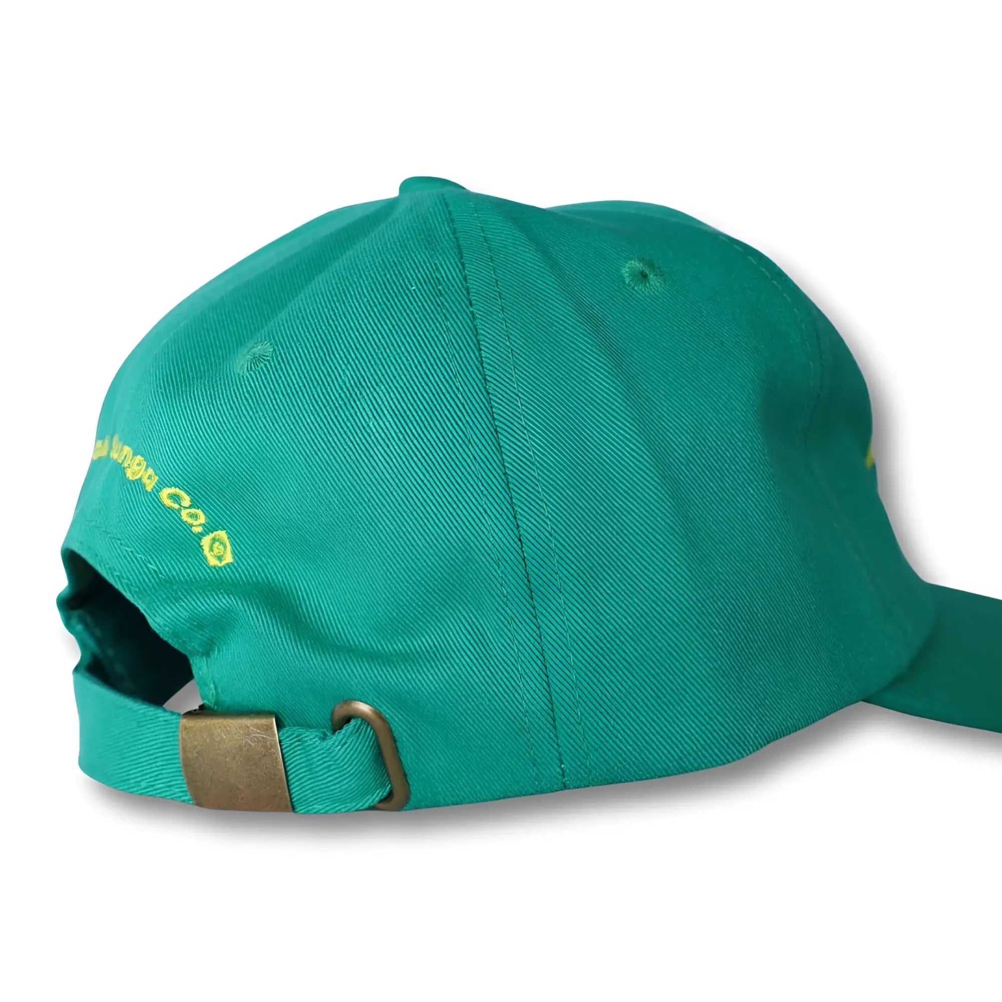 Teal cotton dad hat made in Brasil with yellow embroidered text and brass-colored metal buckle at the back