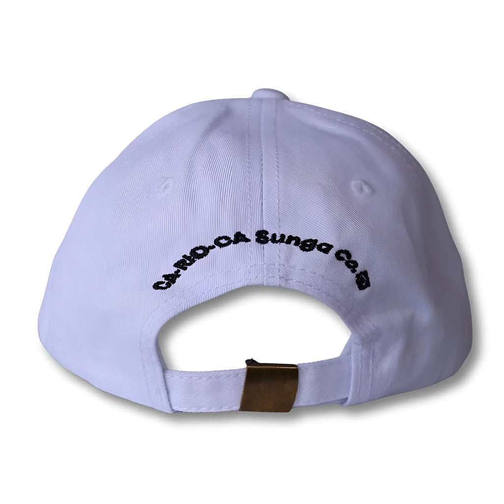 White dad hat made in brasil with black embroidered text and gold-tone metal adjustment strap at the back