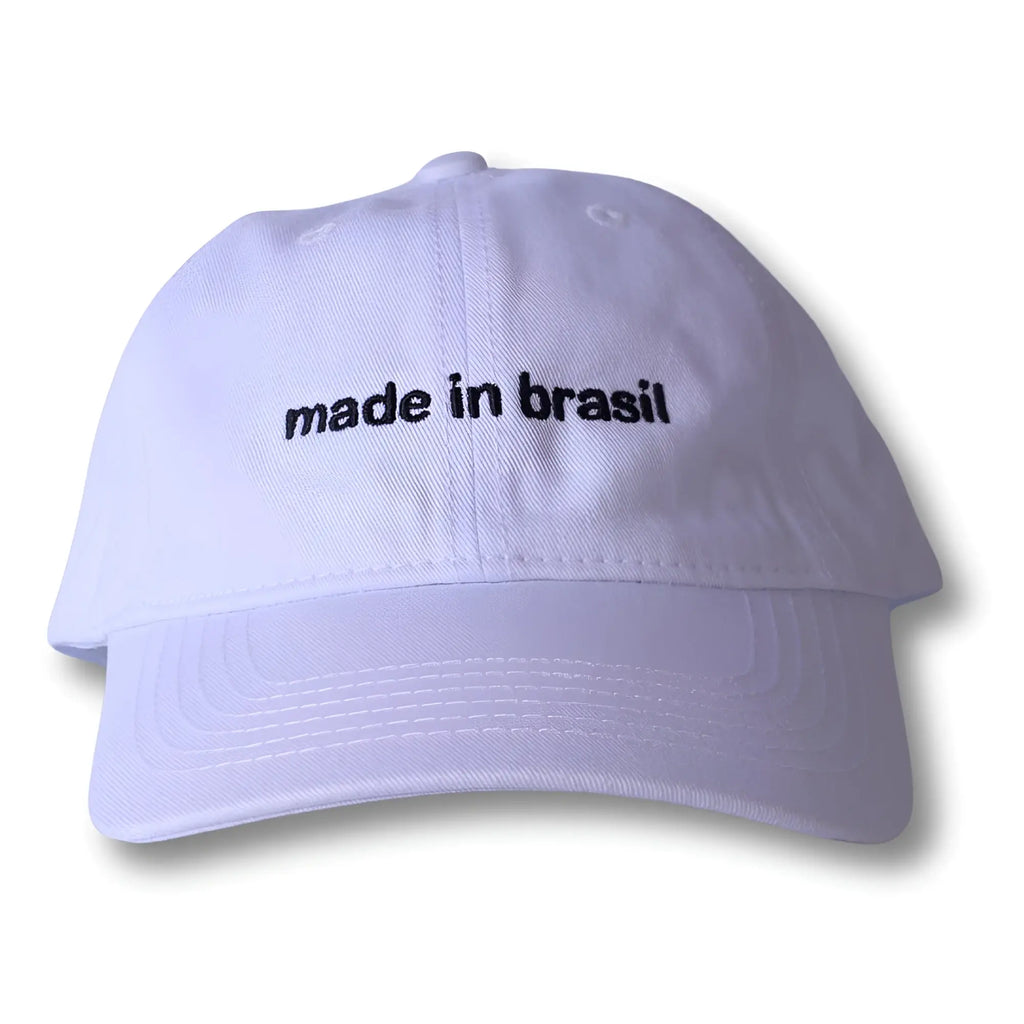 White dad hat with black embroidered made in brasil text front view casual baseball cap
