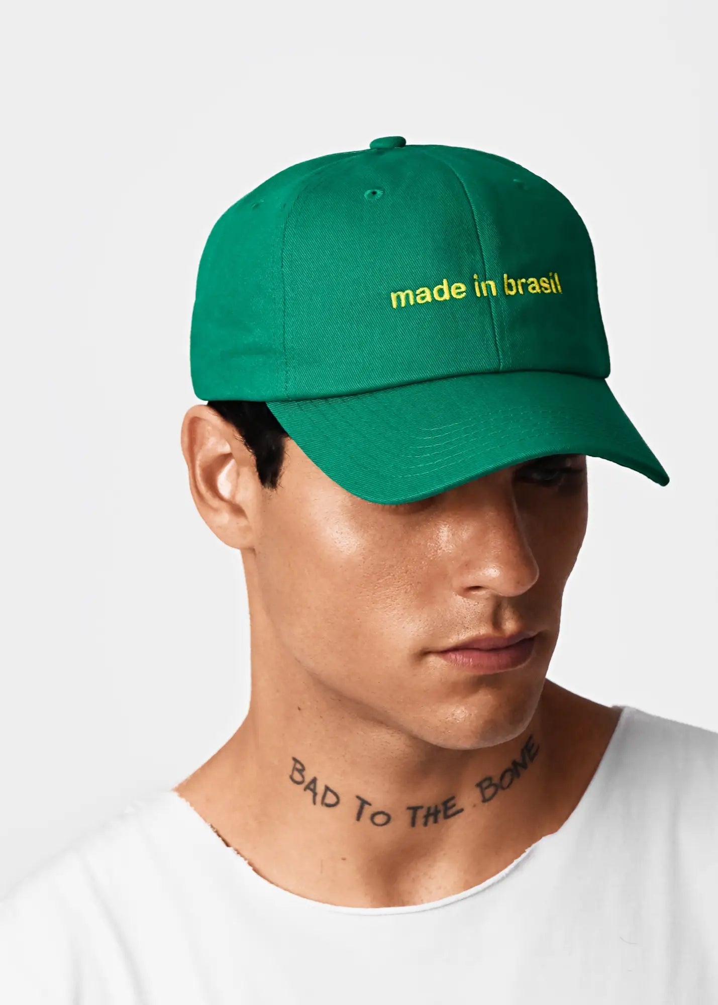 Green baseball cap with yellow made in brazil embroidery featured with men’s cotton sleeveless t-shirt