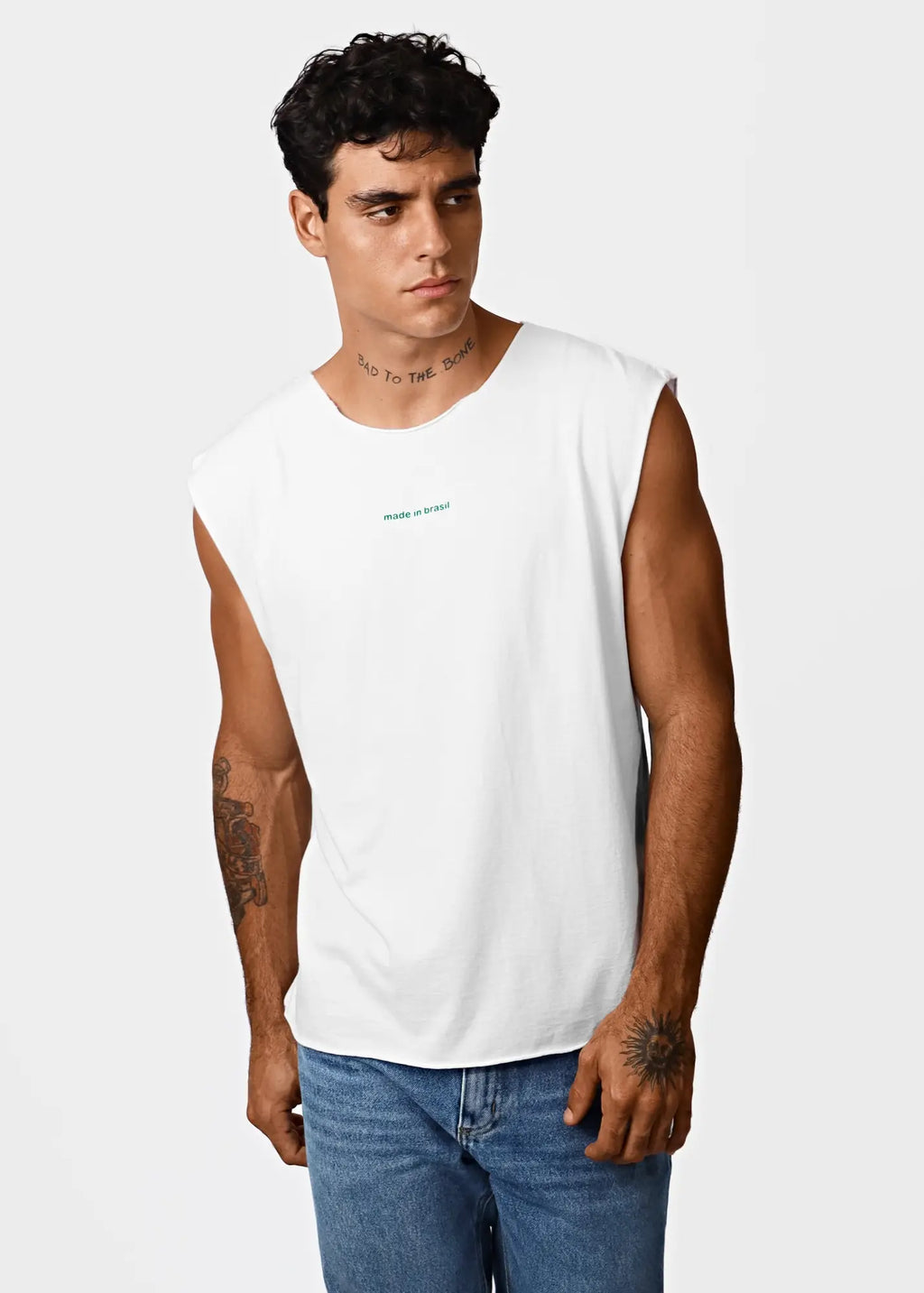 White sleeveless cotton tank top made in brasil with a small green text logo on the chest for men