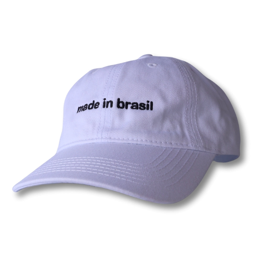 White cotton dad hat with black embroidered made in brasil text across the front for casual wear