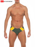 Majorca bikini swim green and yellow athletic swim trunks with bold geometric design and contrasting yellow panels