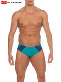 Teal and navy blue geometric design majorca bikini swim trunks from go softwear for comfortable beachwear