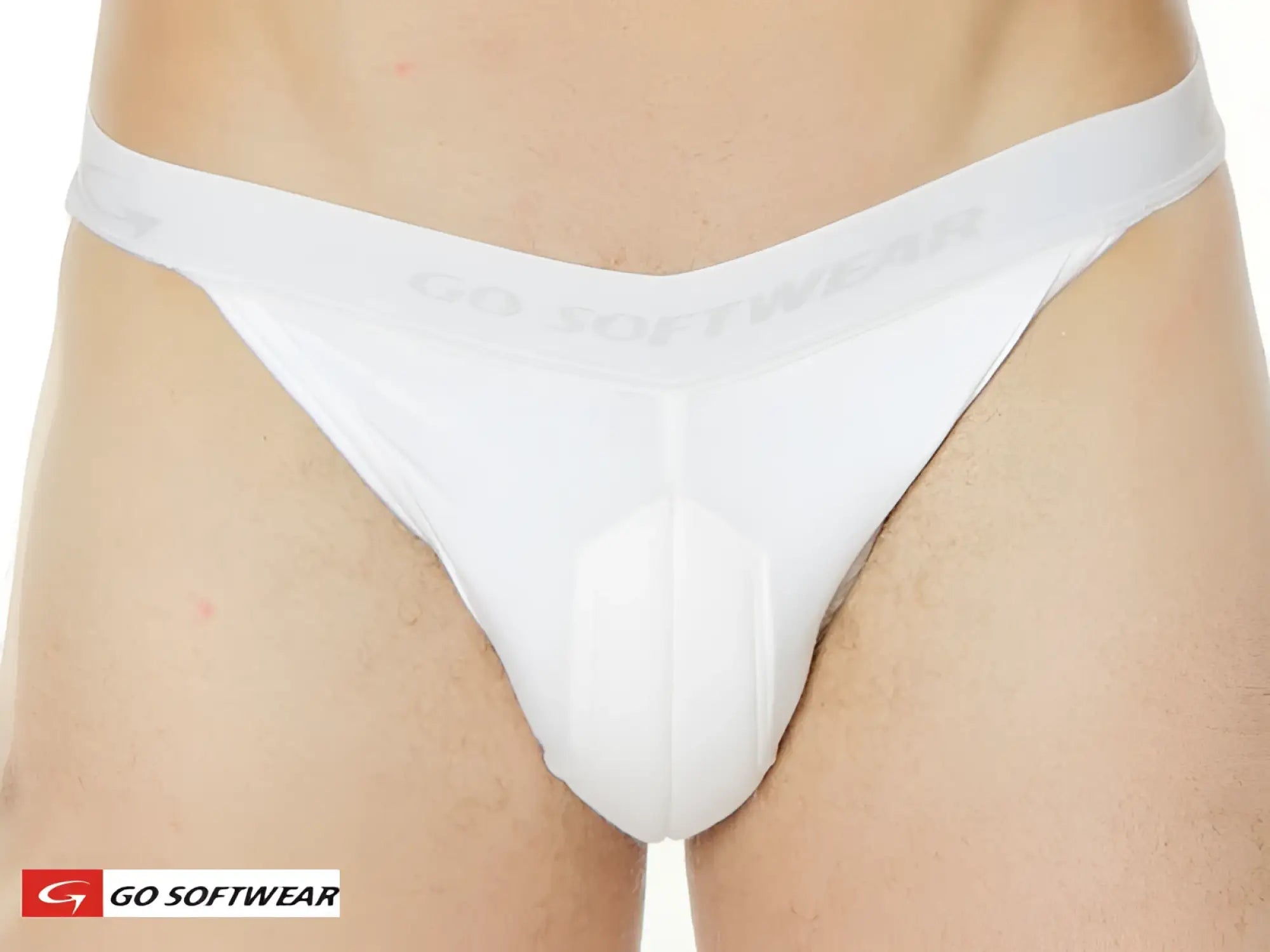 Male enhancer double padded pouch and butt bikini brief in white softwear thong with seamless design and subtle waistband lettering