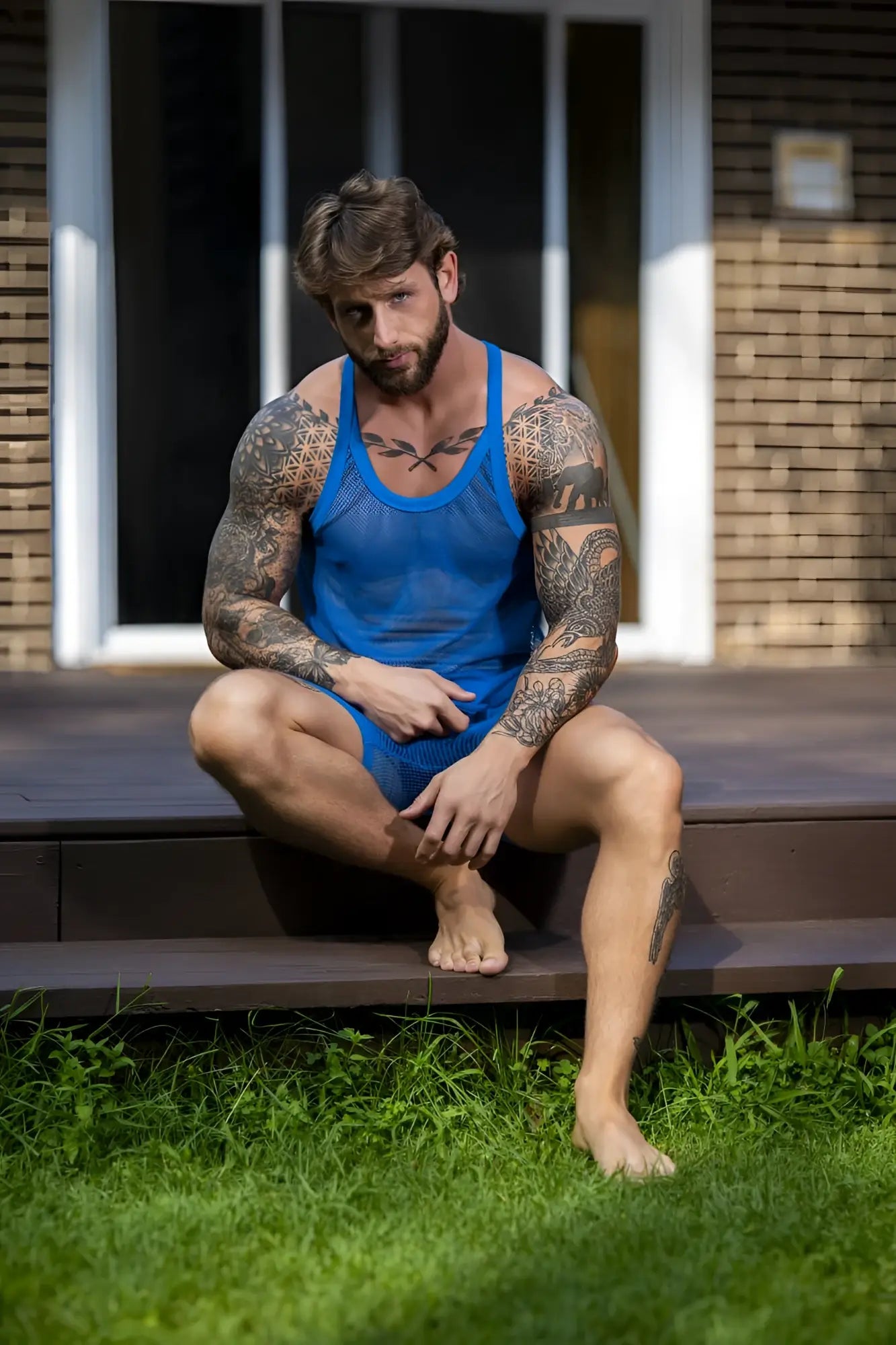 Male power 110-11c fishnet royal blue mesh tank top with matching shorts for bold and breathable style