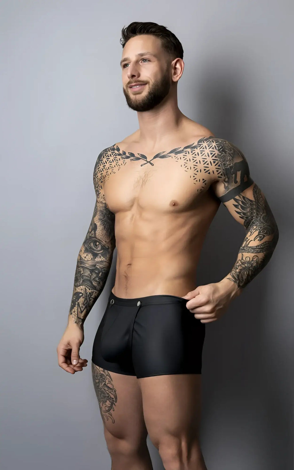 Male power 120-298 oh snap snap off short black sleek form-fitting swim trunks with subtle front zipper detail