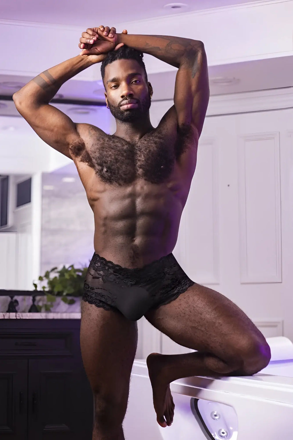 Black lace-trimmed brief from male power 127-280 sassy lace mini short sheer pouch in black color