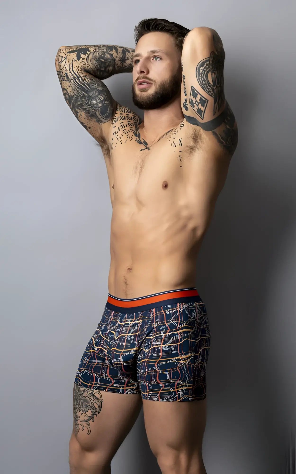 Navy blue Male Power 160-299 Soo Cumfy boxer briefs with orange and white geometric pattern and orange waistband