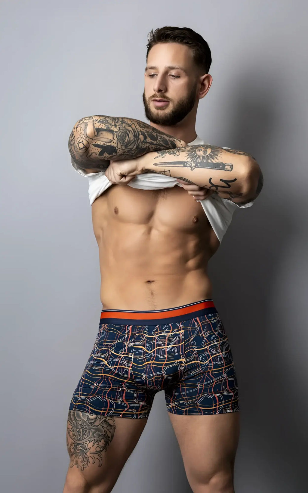 Male power 160-299 soo cumfy boxer briefs in navy with vibrant orange pink and white geometric pattern and orange waistband