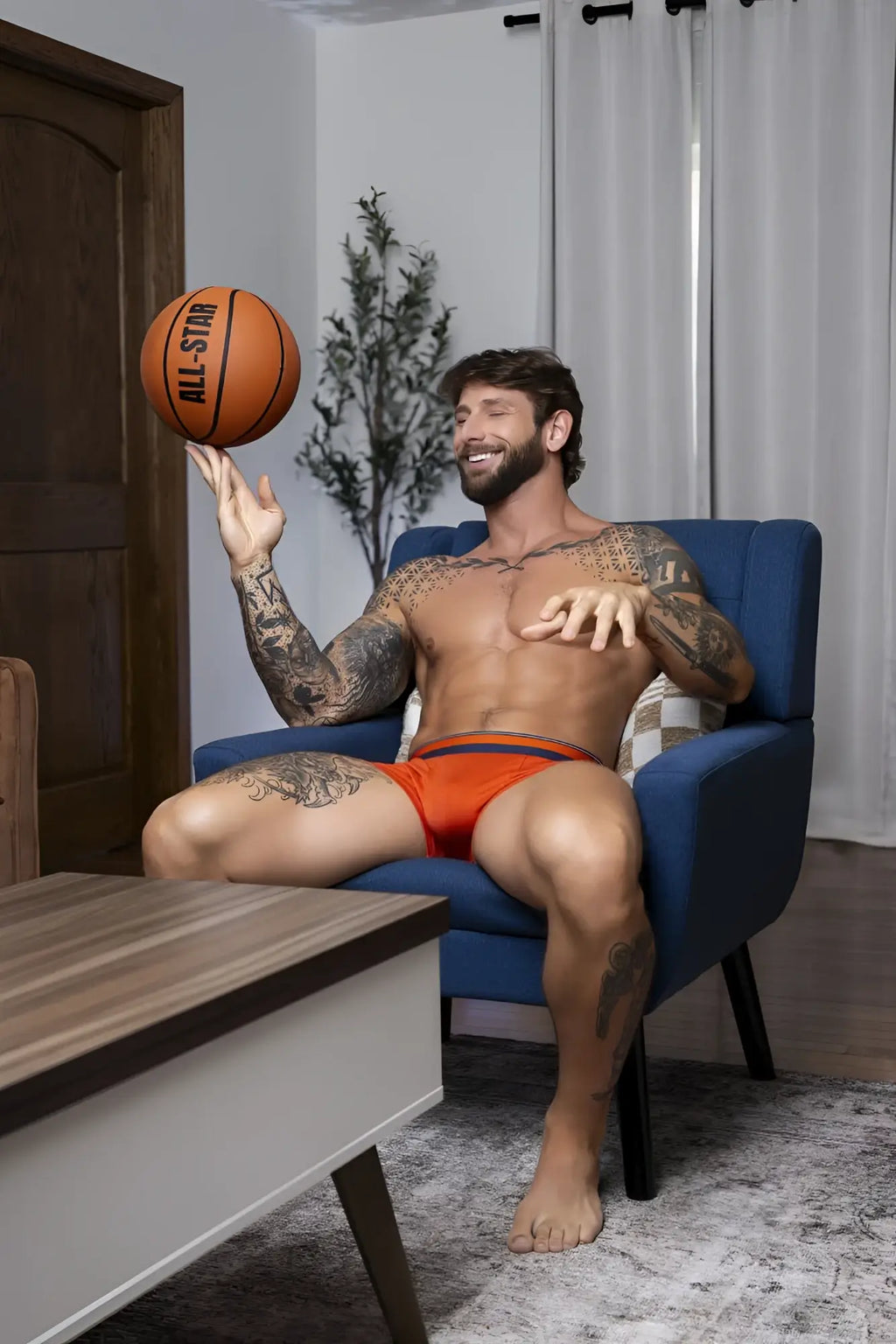 Male power orange soo cumfy boxer brief featuring a black all-star basketball design for comfortable wear