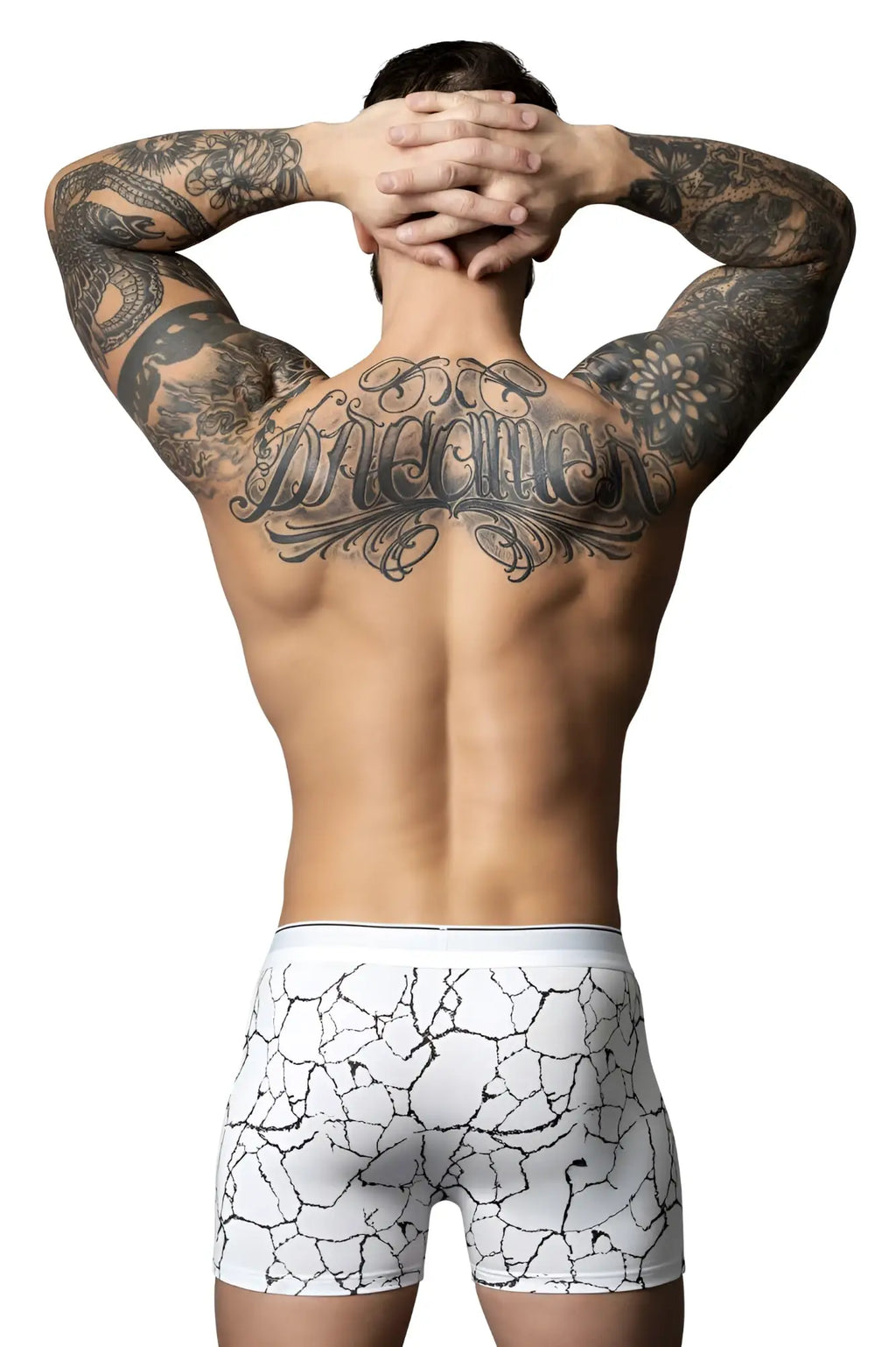 White-black male power soo cumfy boxer brief featuring a white base with black cracked earth pattern design