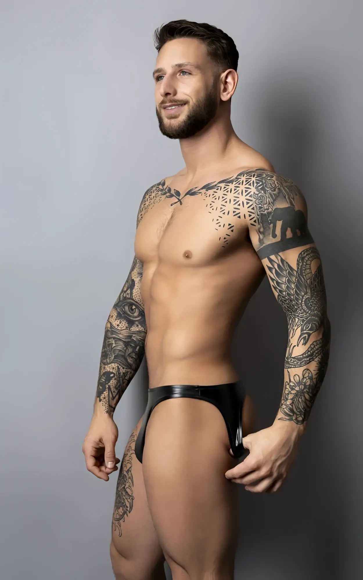 Male power 300-301 liquid onyx 2.0 moonshine black male latex briefs shown from the back side