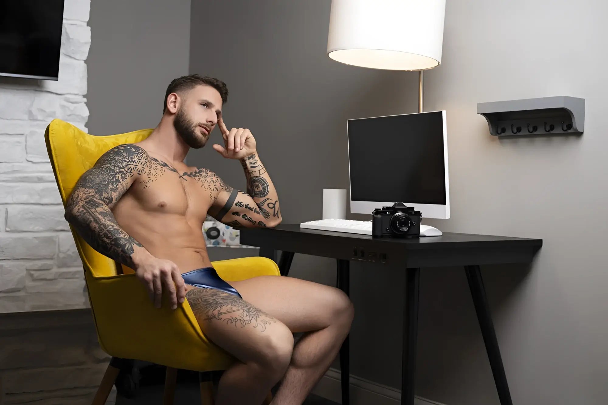 Black classic designed camera on desk next to male power 442 301 liquid onyx 2 0 blue bong thong product