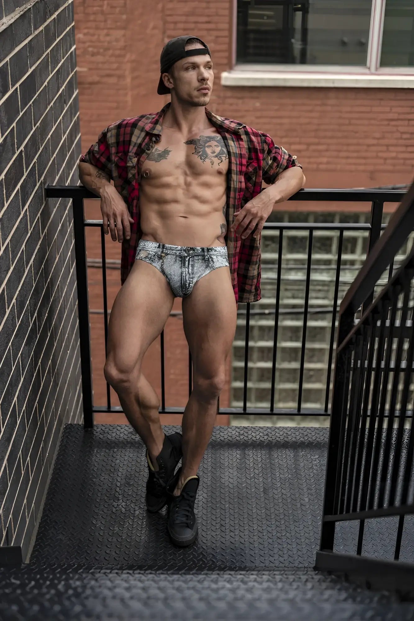 Male power 486-286 dirty denim bikini briefs in faded blue and white denim print with subtle stitching details