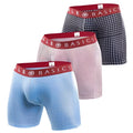 Set of three malebasics boxer briefs in blue pink and navy with polka dots stripes and red elastic waistbands