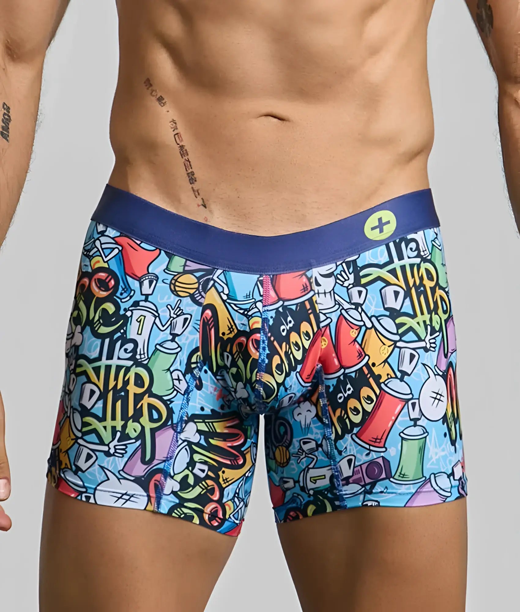 Malebasics boxer brief hipster with vibrant graffiti print featuring colorful spray paint cans skulls and hip hop lettering