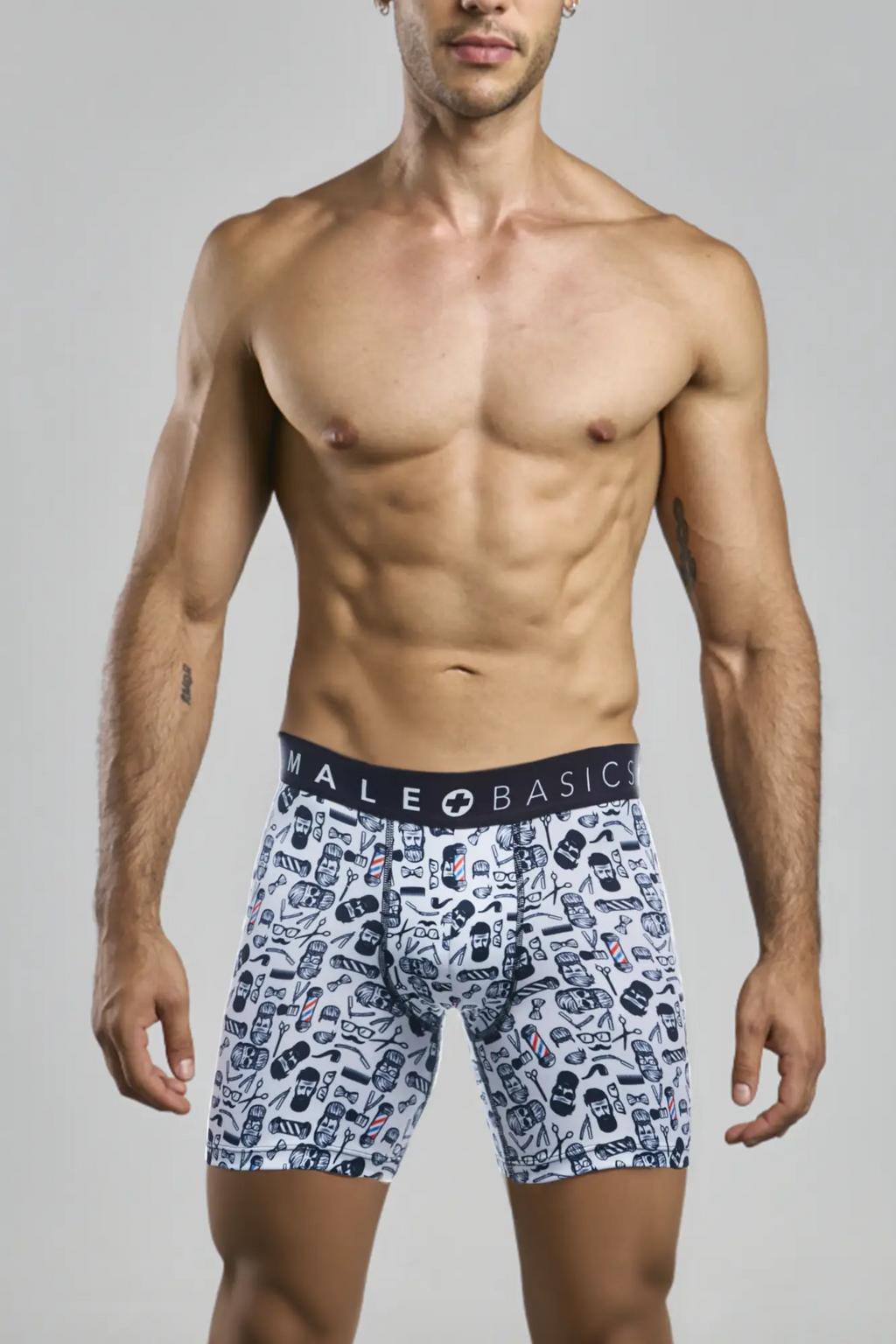 White boxer briefs with black and navy barber skulls print featuring male basics brand on the waistband