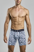 White boxer briefs with black and navy barber skulls print featuring male basics brand on the waistband