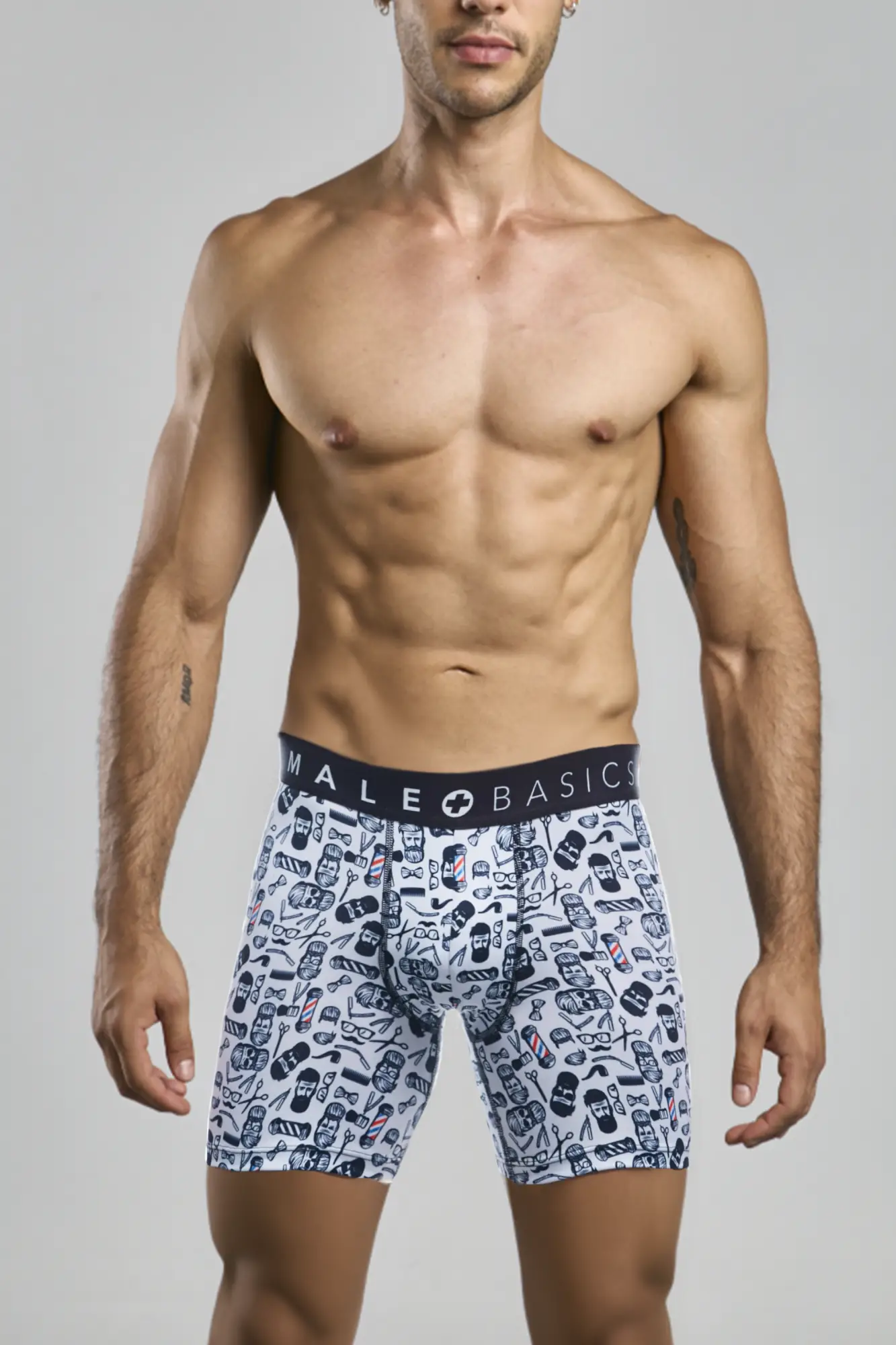 White boxer briefs with black and navy barber skulls print featuring male basics brand on the waistband