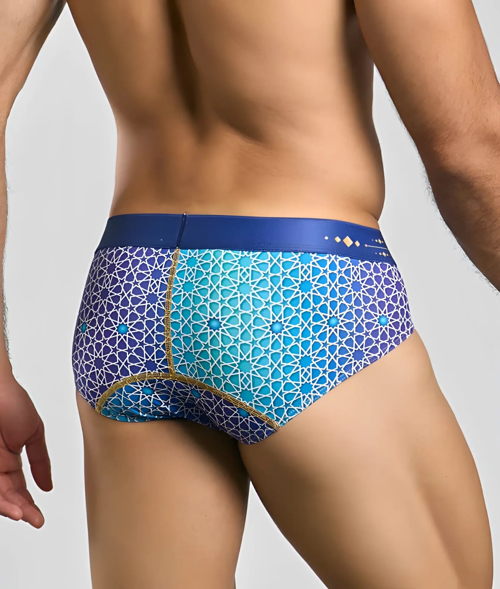 Malebasics hipster brief in blue and turquoise geometric pattern with gold trim designed for men’s comfort and style