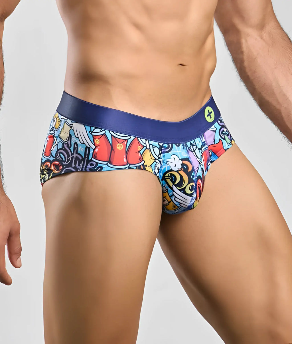 Malebasics hipster briefs with vibrant graffiti-style colorful cartoon graphics and navy blue waistband