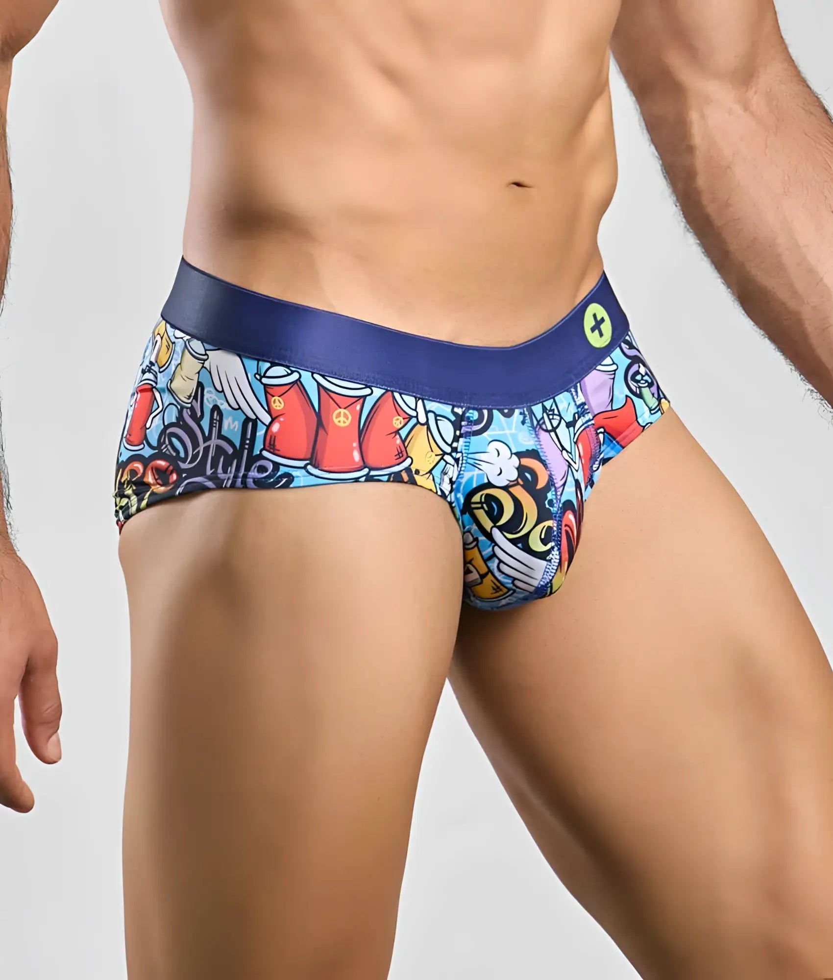 Malebasics hipster briefs with vibrant graffiti-style colorful cartoon graphics and navy blue waistband
