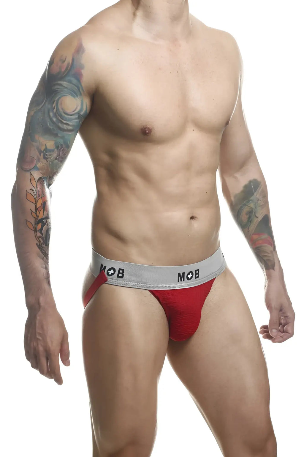Red athletic briefs with a gray mob logo waistband from malebasics mbl107 classic fetish jockstrap in red