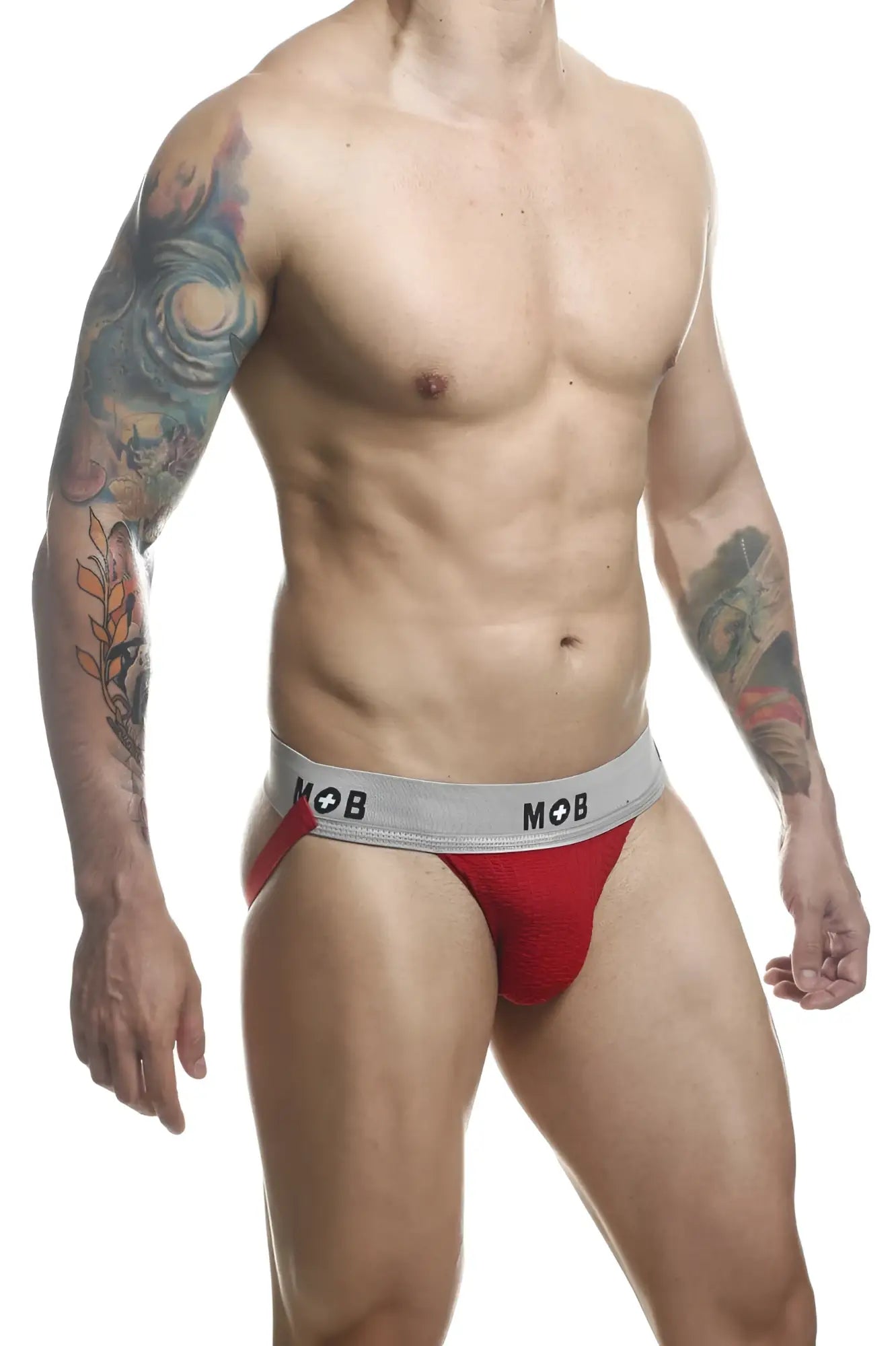 Red athletic briefs with a gray mob logo waistband from malebasics mbl107 classic fetish jockstrap in red