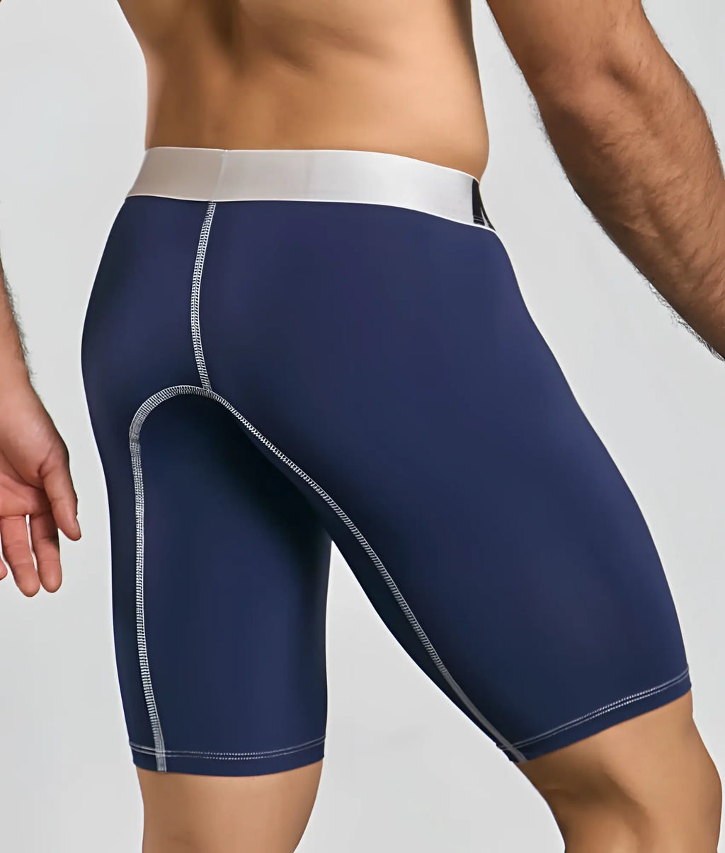 Navy blue MaleBasics microfiber athletic boxer briefs with white elastic waistband and gray stitching along seams