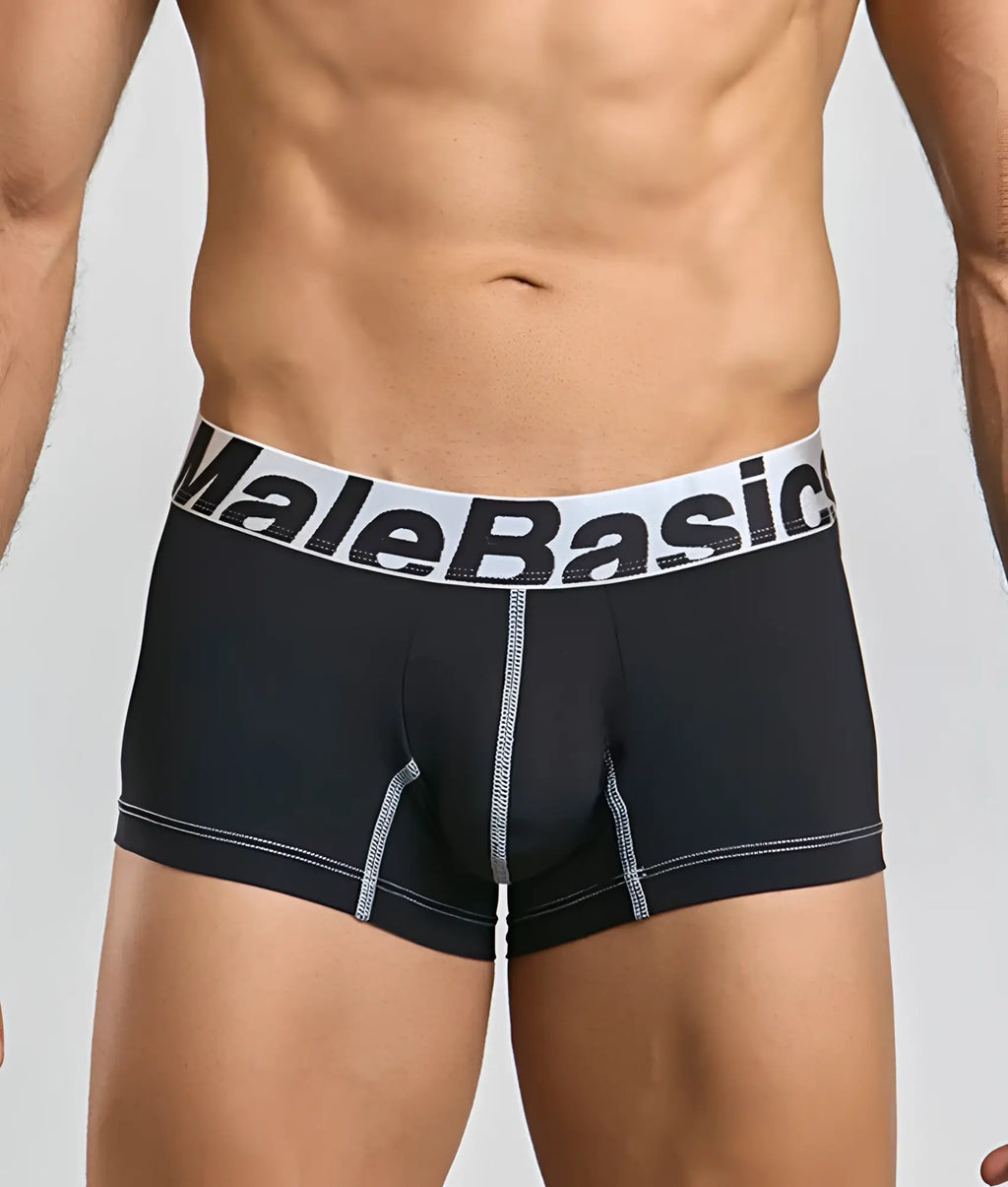 Black malebasics microfiber boxer briefs with white waistband bold black lettering and silver stitched seams visible
