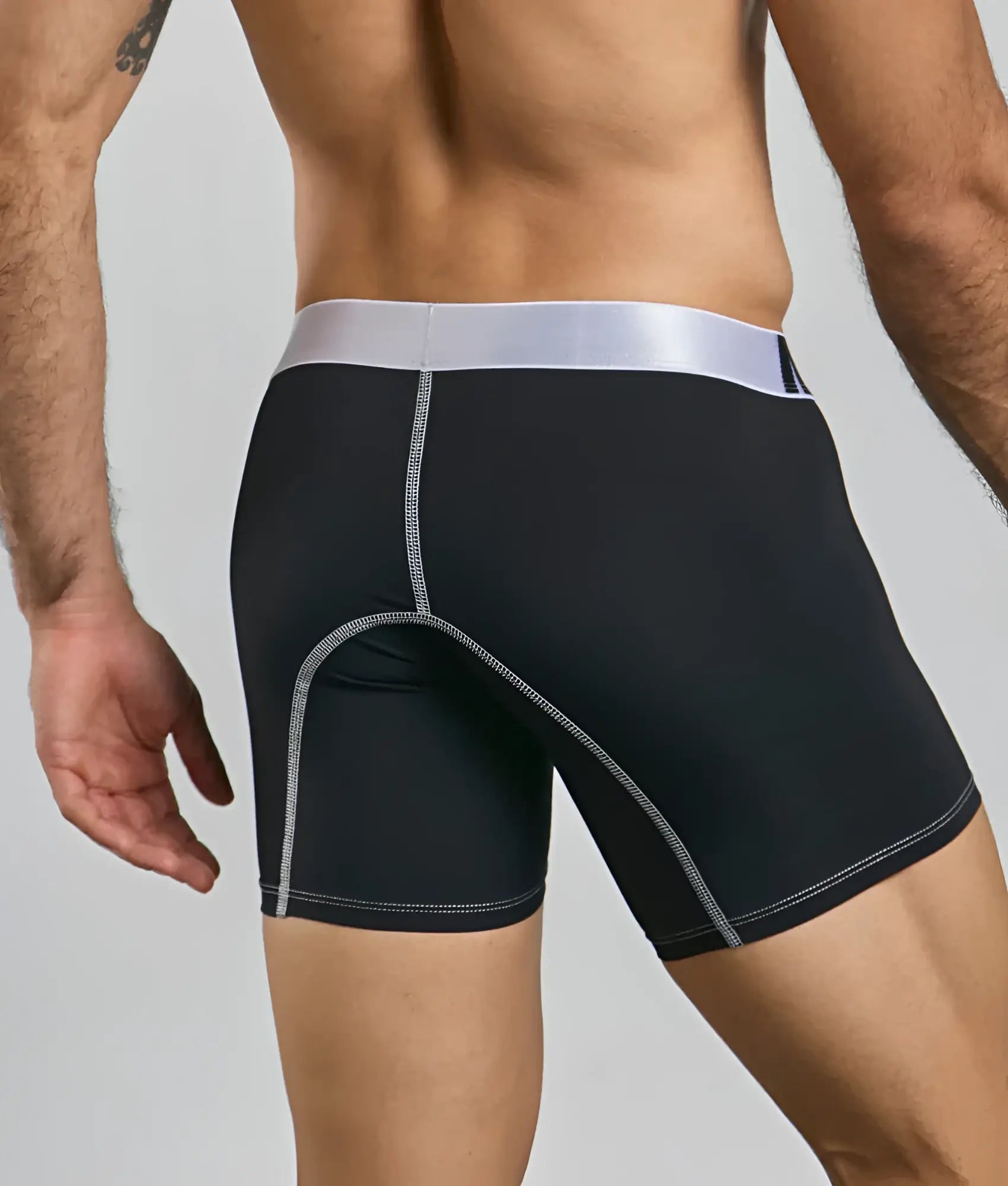 Black athletic microfiber boxer brief with silver waistband and matching stitching from malebasics