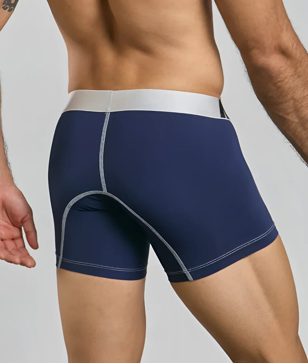 Navy blue malebasics microfiber boxer brief with white waistband and matching stitching for comfortable wear