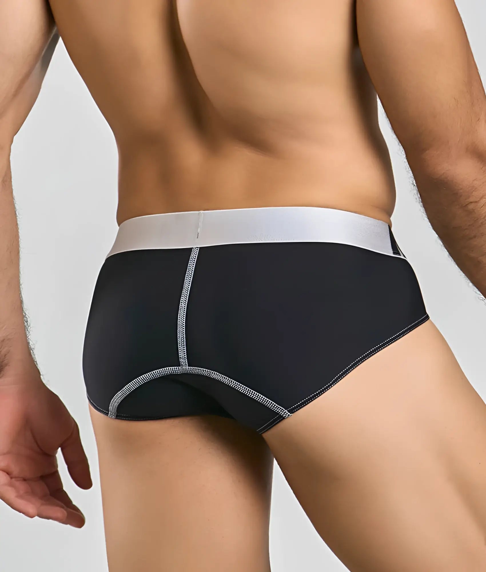 Black microfiber briefs with silver waistband and matching stitching details from malebasics microfiber brief collection