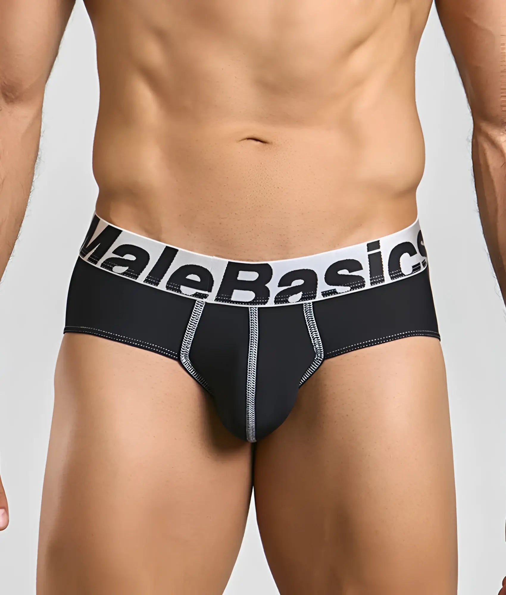 Black malebasics microfiber briefs with white waistband bold black lettering and silver stitching along seams