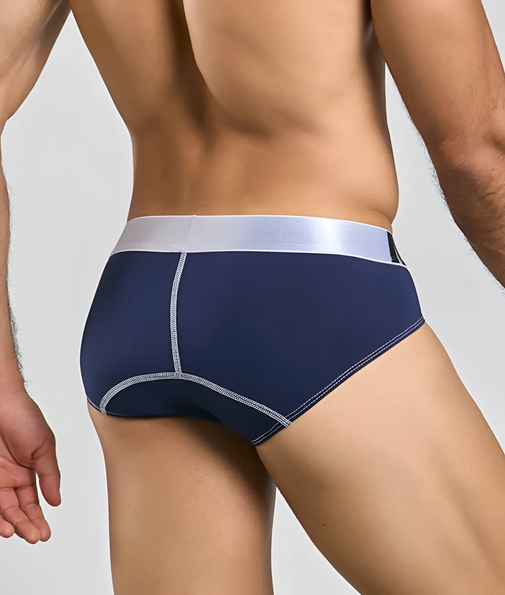 Navy blue malebasics microfiber briefs with silver waistband and matching stitching details for comfortable wear
