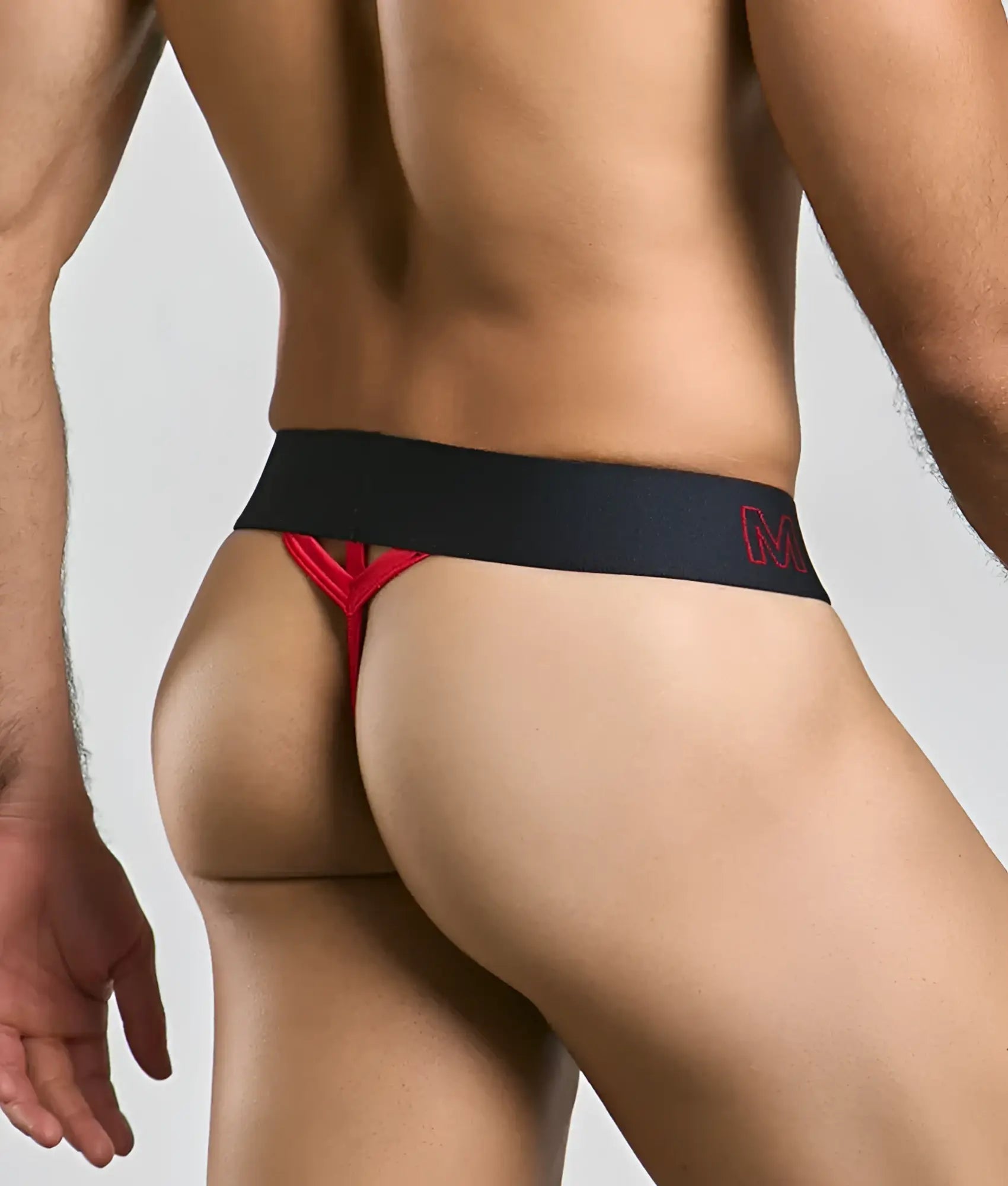 Malebasics neon thong in black and red with bold contrasting design showing the back side of the product