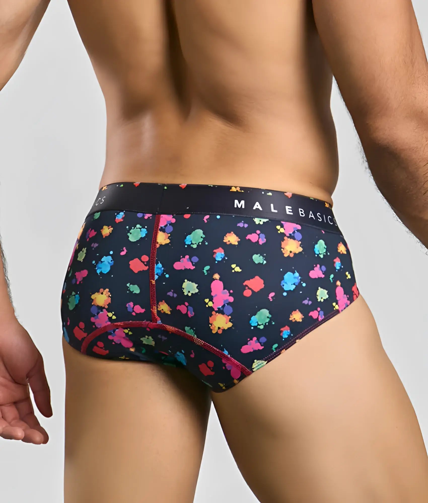 Malebasics new hipster brief black splash features black briefs with vibrant multicolored paint splatter and red stitching