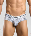 White and black geometric patterned men’s briefs with branded waistband from malebasics new hipster brief spider collection