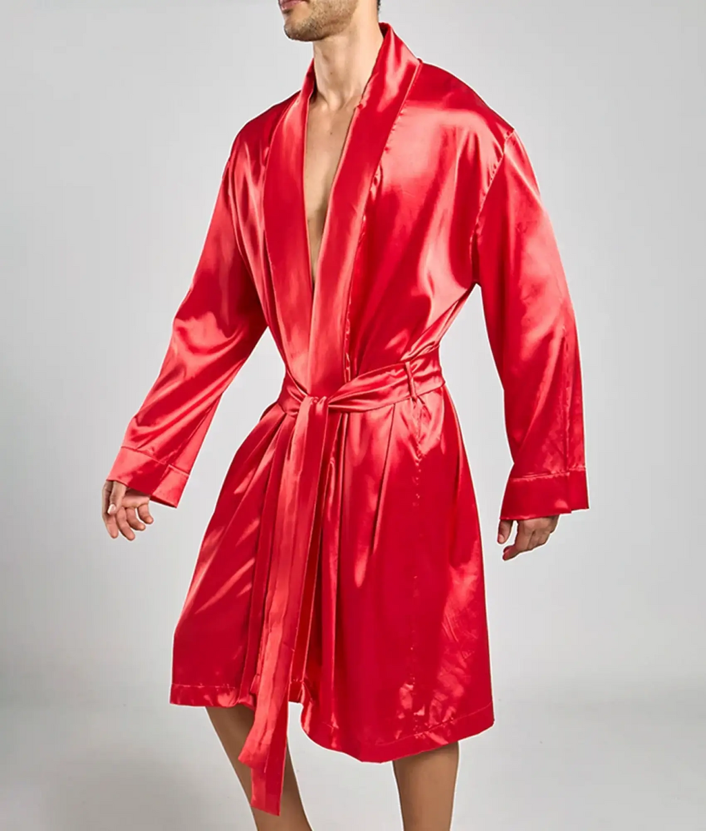 A vibrant red satin Malebasics robe with long sleeves a matching belt and classic wrap design