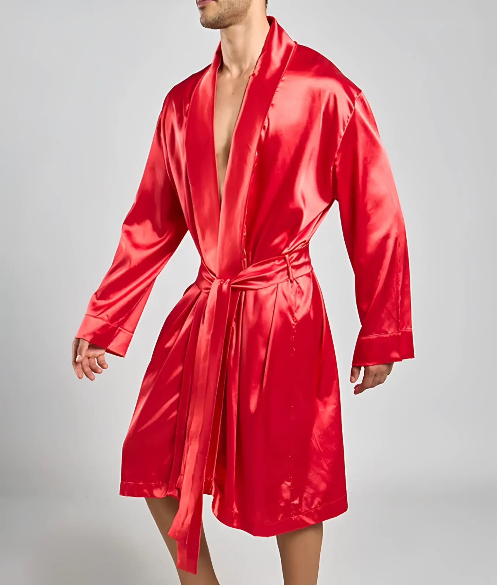 A vibrant red satin Malebasics robe with long sleeves a matching belt and classic wrap design
