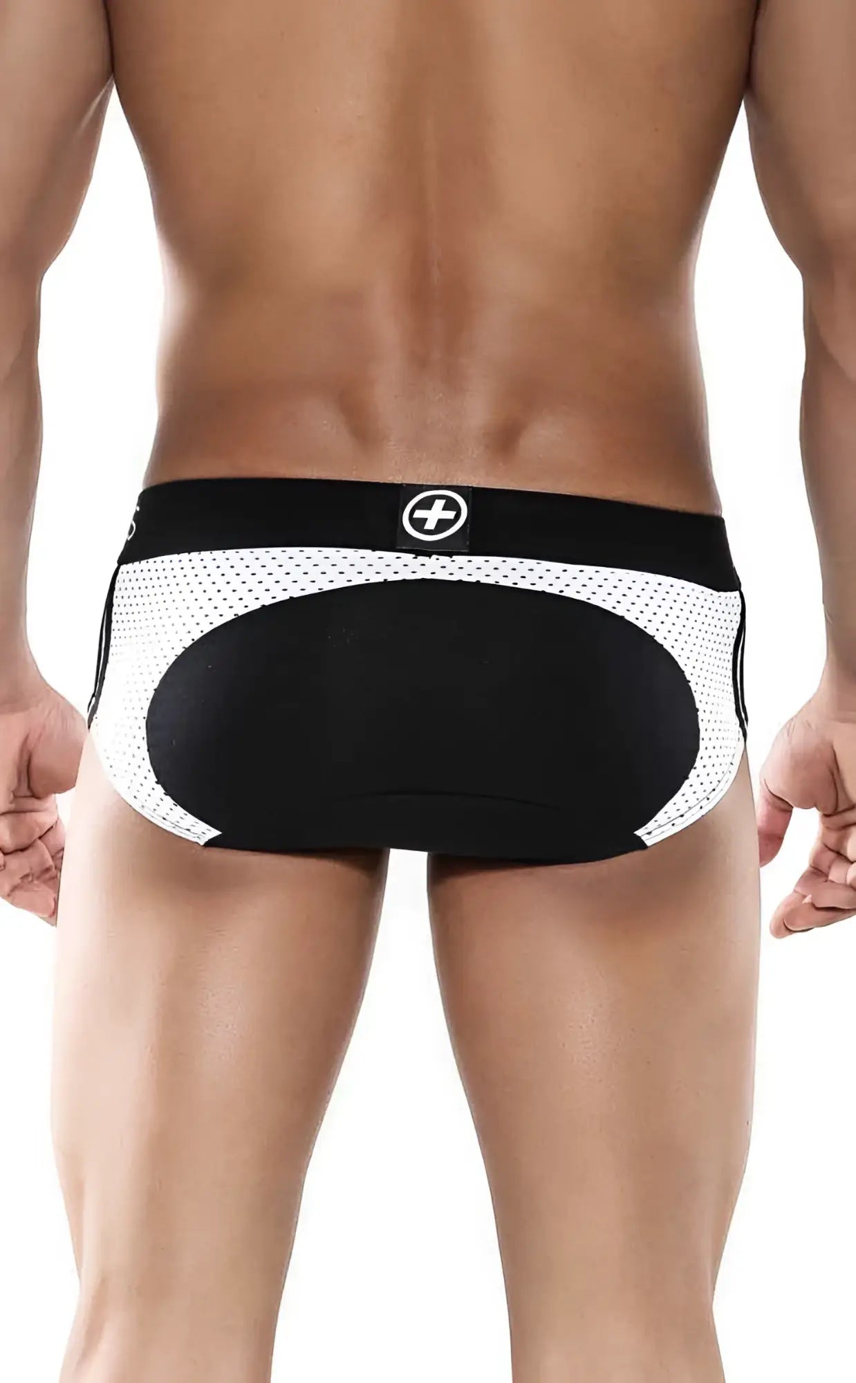 Black and white mesh malebasics spot brief showing the back with solid black panel and circular waistband logo
