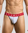 Malebasics spot jockstrap in white mesh briefs with red waistband and male basics logo featuring white cross symbol