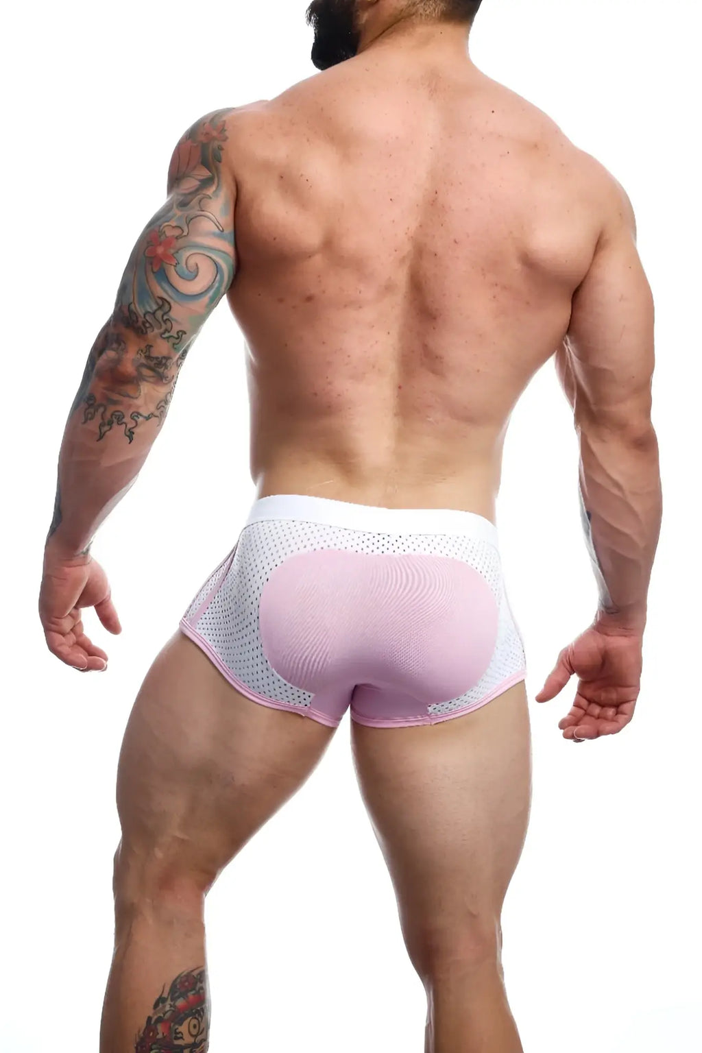 Back view of malebasics spot new sexier trunk pink mesh briefs with contoured padded rear panel